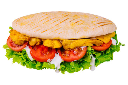 Doner kebab - fried chicken meat with vegetables in pita breadの写真素材