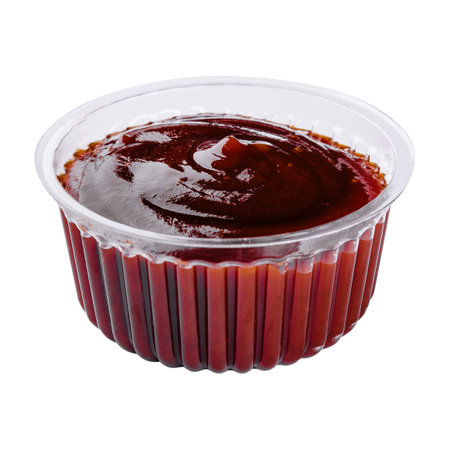 plastic dish of barbecue sauce on white backgroundの写真素材