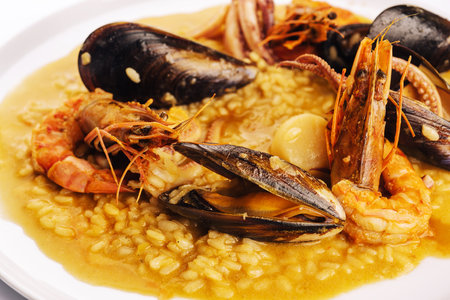 Seafood risotto with mussel shrimp and squidの写真素材