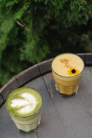 tea matcha latte on wooden backgroundの写真素材