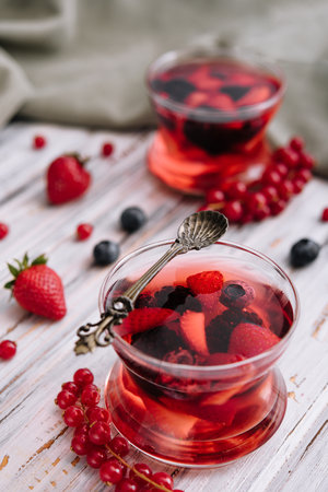 Jelly with fresh berries on wooden table close upの写真素材