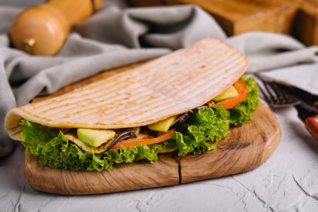 Tacos with zucchini, lettuce and tomatoesの写真素材