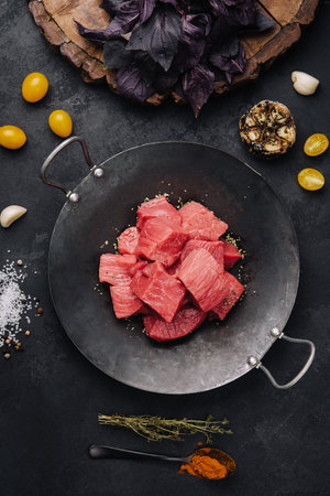 Raw meat is cut into pieces top viewの写真素材