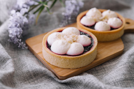 Dessert basket with blueberries jam on wooden trayの写真素材