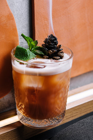Cocktail with preserved sweet cedar cone