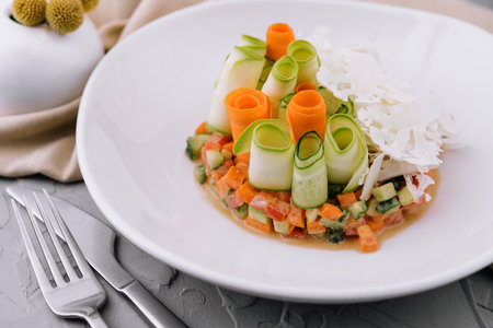vegetable tartar of cucumber, carrot and tomatoの写真素材