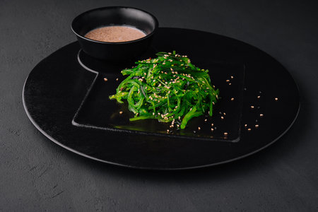 Wakame seaweed salad with sesame seedsの写真素材