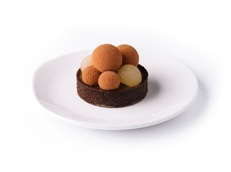 chocolate mini tart decorated with chocolate ballsの写真素材