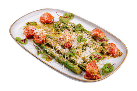 Baked asparagus with cherry tomatoesの写真素材