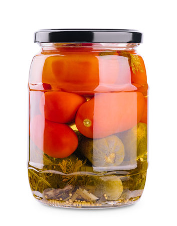 Salted cucumbers and tomatoes, in a glass jarの写真素材