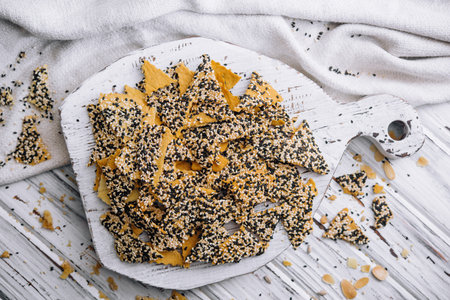 Salted tortilla chips triangle with chia seeds on top viewの写真素材