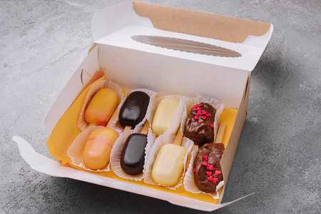 orange, vanilla, chocolate desserts in the form of ice cream