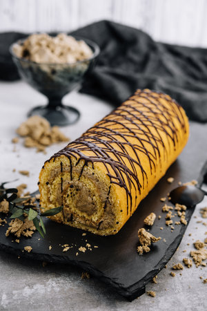 dessert roll with halva on a plateの写真素材