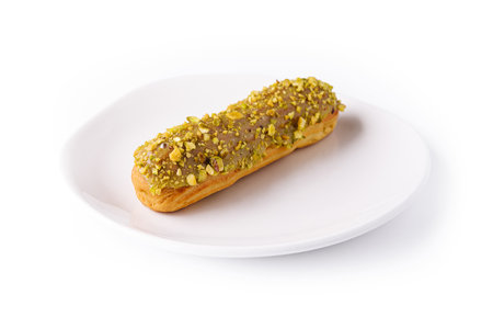 dessert eclair with pistachios with crumbs
