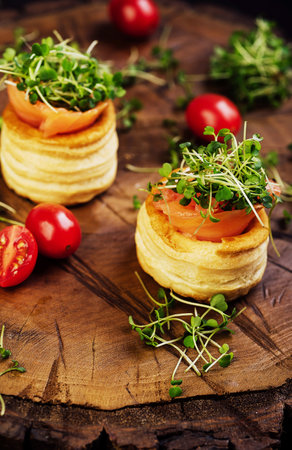 Canape with salmon on woodの写真素材