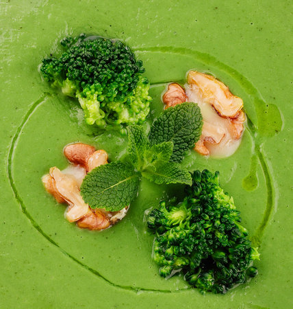 broccoli cream soup with walnut close upの写真素材