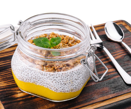 Chia pudding with exotic fruits and granolaの写真素材