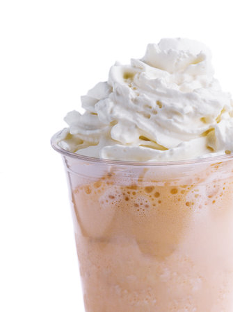 Chocolate milkshake with whipped cream on white