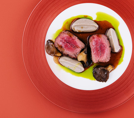 duck tenderloin in sauce with mushroomの写真素材