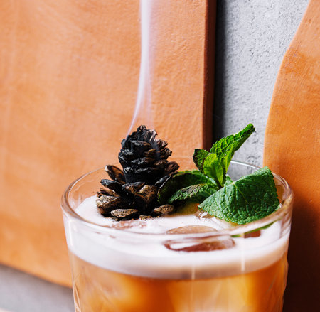 Cocktail with preserved sweet cedar coneの写真素材