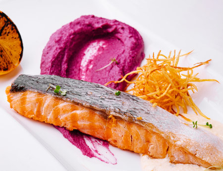 Salmon with beetroot puree and cream sauceの写真素材