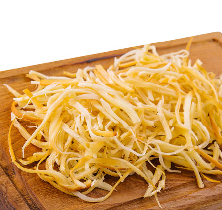 georgian sulguni cheese on wooden cutting boardの写真素材