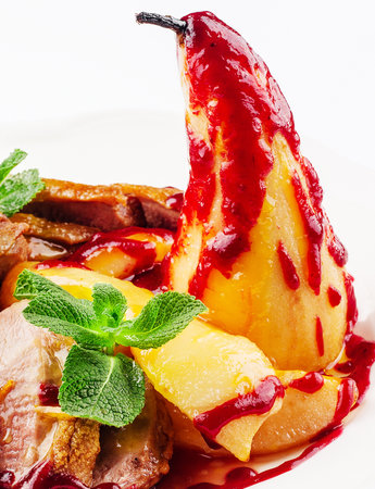 Fried duck fillet with pear close upの写真素材