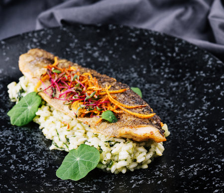 Baked white fish fillet served with steamed riceの写真素材