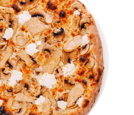 Pizza with chicken and mushrooms on plateの写真素材