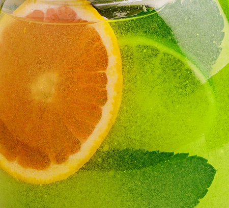 refreshing tea with lime and orange and mintの写真素材