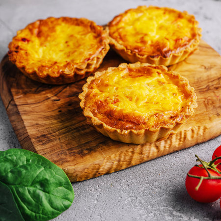Mini quiche lorraine with cheddar cheeseの写真素材