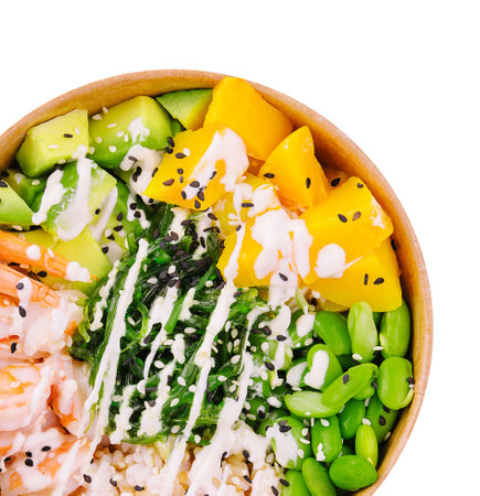 bowl with shrimp, pineapple, avocado, beans and seaweedの写真素材