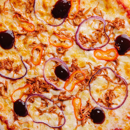 Pizza with Mozzarella cheese, chicken, Spices Italian pizzaの写真素材