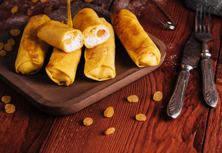 Sweet rolled pancakes with cottage cheeseの写真素材