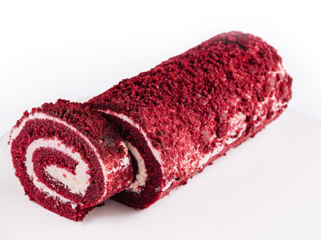 Sponge Swiss roll on white plateの写真素材