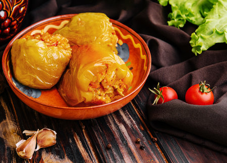 Baked bell peppers stuffed with meat, onions and riceの写真素材