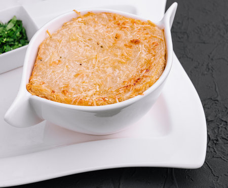 French onion soup with cheese in bowlの写真素材