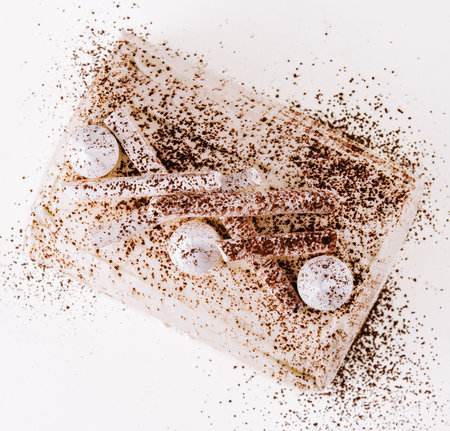 White whipped cream cake on white plate