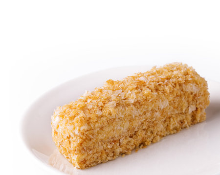 Slice of Napoleon Cake on a white plateの写真素材