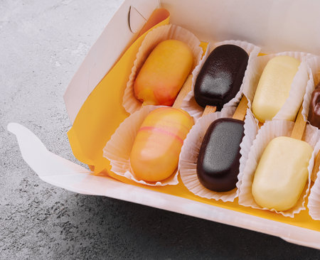 orange, vanilla, chocolate desserts in the form of  ice cream