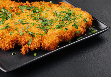 Breaded fried pork chop close upの写真素材