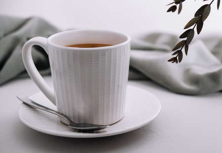 Close up of Cup of coffee on plateの写真素材