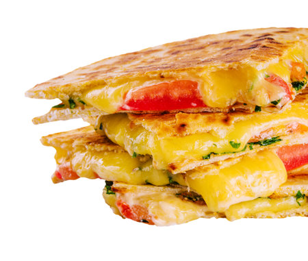 Cheddar cheese quesadillas isolated on whiteの写真素材