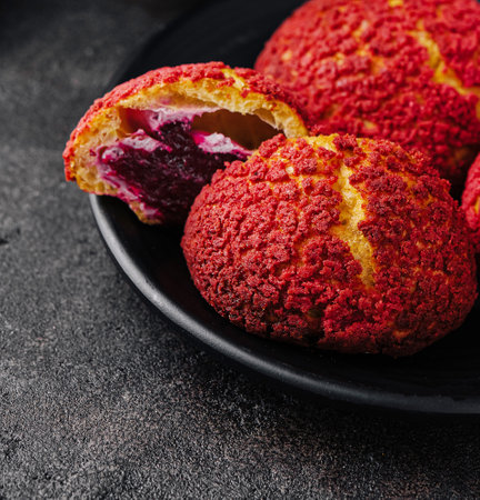 PoofPoof Butterscotch on black plate on stoneの写真素材