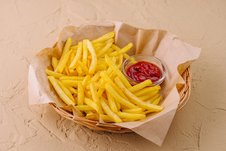 French Fries with Ketchup in Basket