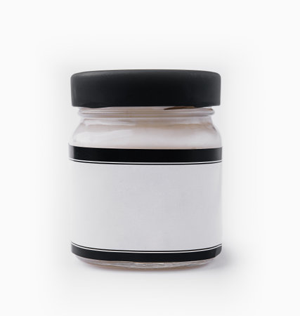 Mayonnaise in Glass Jar isolated on whiteの写真素材