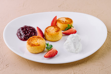 Cottage cheese pancakes with strawberriesの写真素材