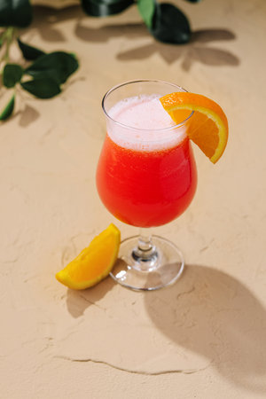 red alcohol cocktail on stoneの写真素材
