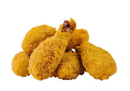 Fried chicken drumsticks isolated on white backgroundの写真素材