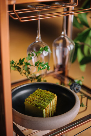 Pistachio cake with cream and pistachiosの写真素材